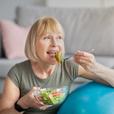 Woman eating a salad