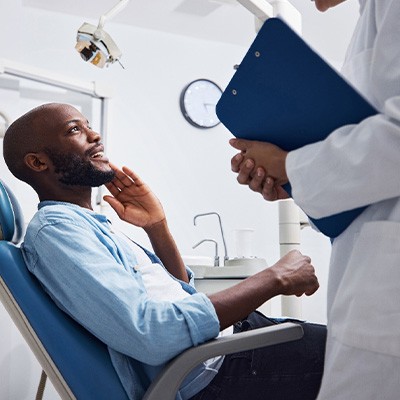 Man smiling at the dentist