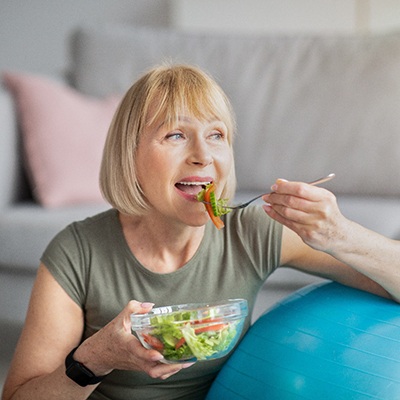 Woman eating a salad